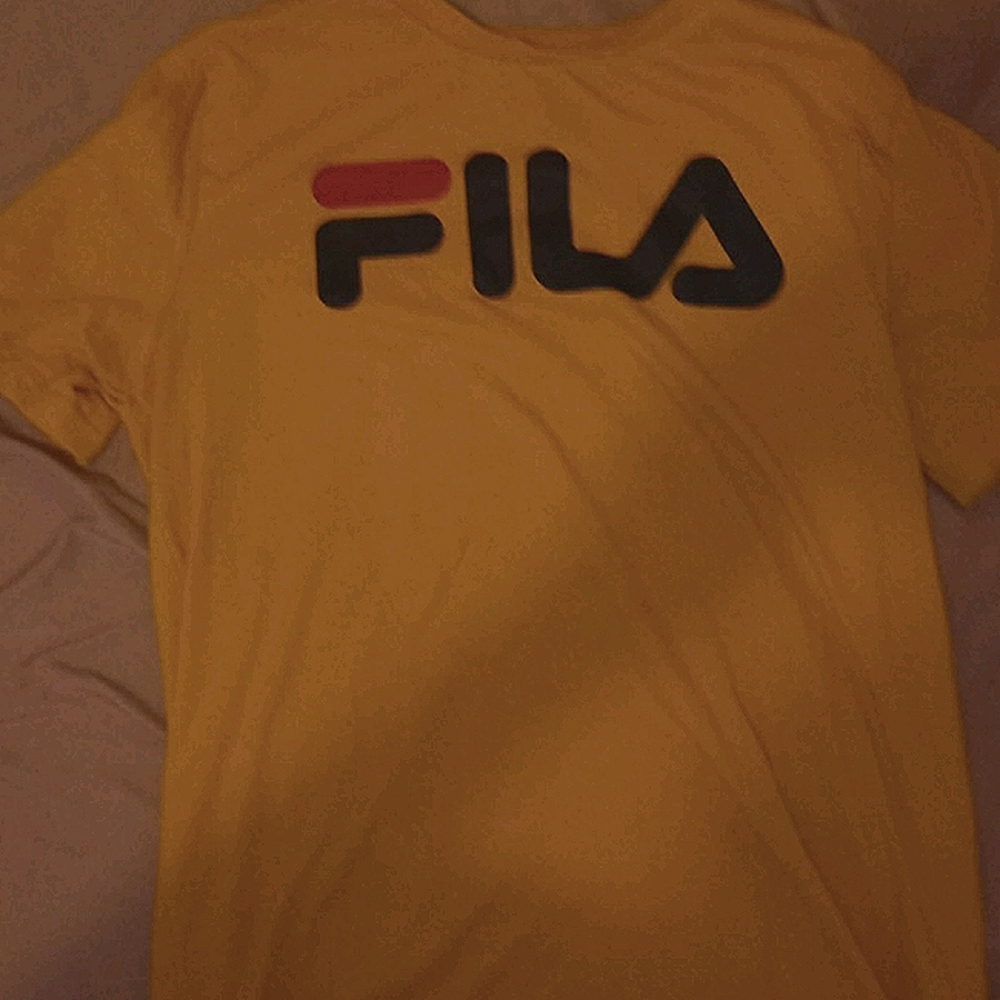 Bright yellow fila shirt